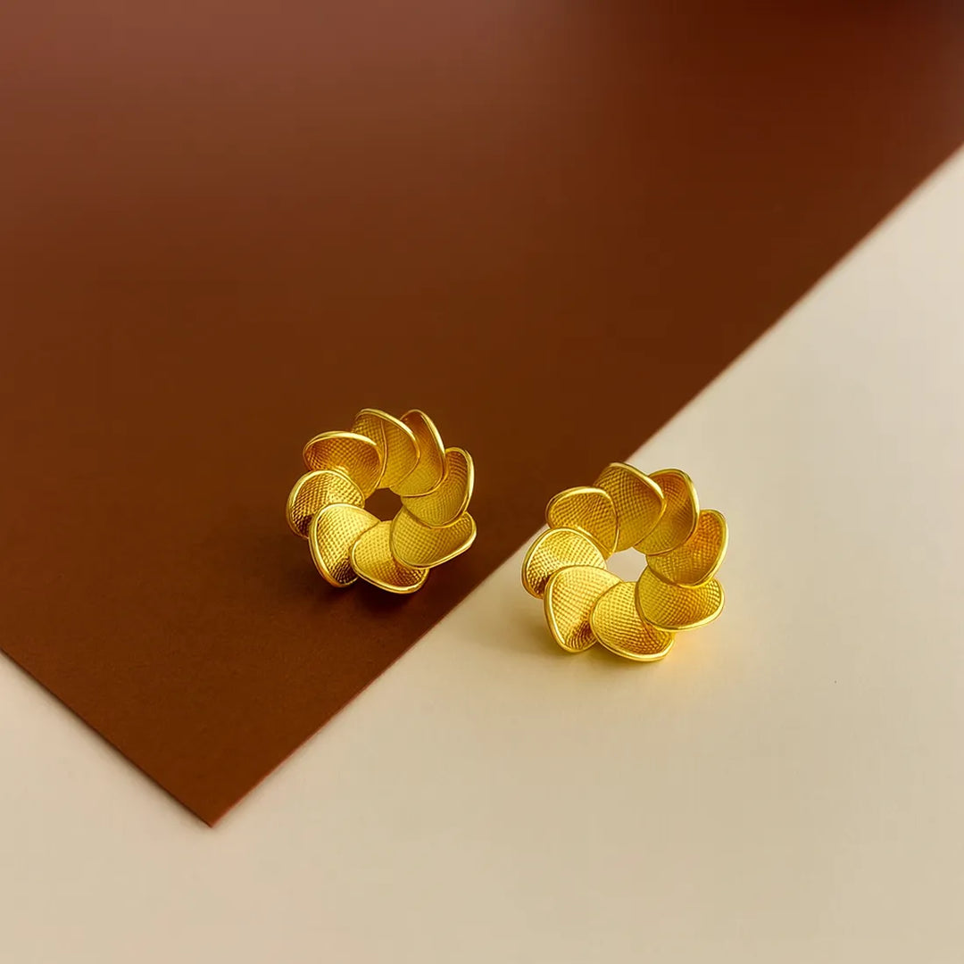 MARCELA RODRIGUEZ TOPO POMPONERO DORADO Y O PLATA