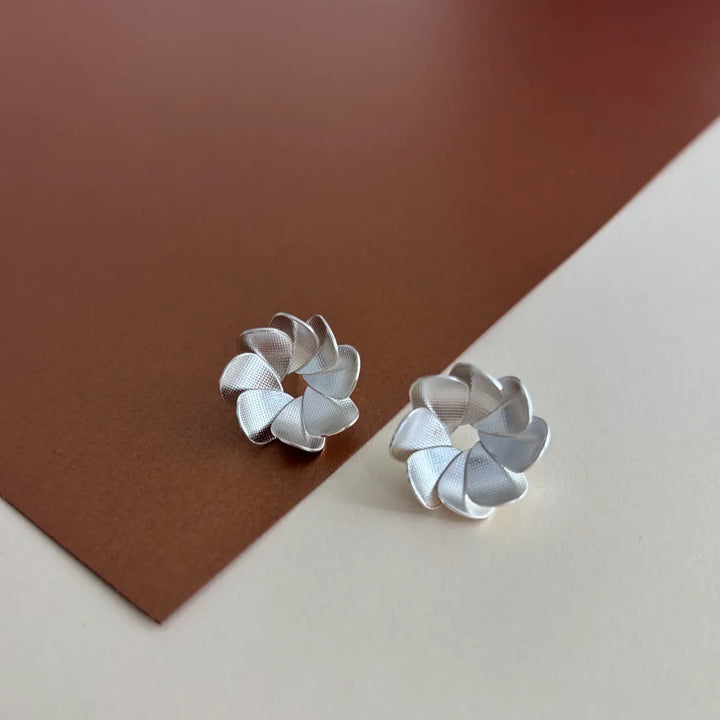 MARCELA RODRIGUEZ TOPO POMPONERO DORADO Y O PLATA